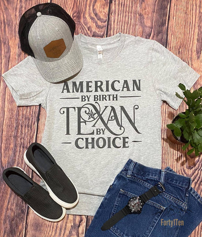 Heather Athletic Grey T-Shirt with Black American By Birth Texan by Choice Design.