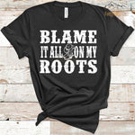 Black T-Shirt with distressed white "Blame It All On My Roots" design.