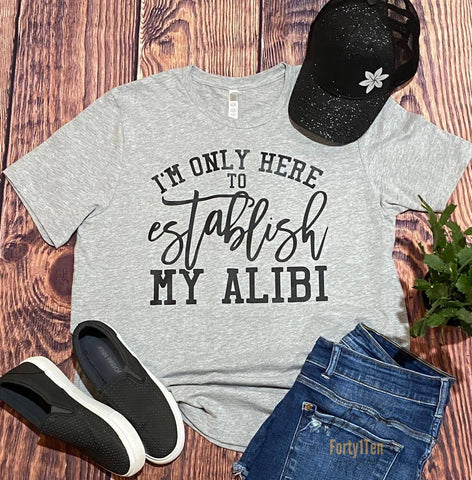 Heather Grey Tee with "I'm Only Here To establish My Alibi" design in black.