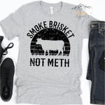 Athletic Heather Grey T-Shirt with Distressed " Smoke Brisket Not Meth " Design.